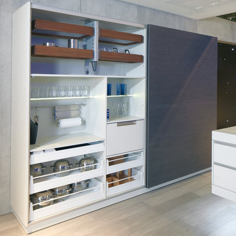 Discreet reinforcement kit for tall cabinet doors, designed to prevent warping or bowing over time. Suitable for vertical or horizontal installation on hinged or sliding wooden doors 16 mm thick or more. Includes steel threaded rod, zinc alloy tensioner, and plastic trim components in black or white. Recess-mounted for seamless integration, with easy tension adjustment via hex nut.