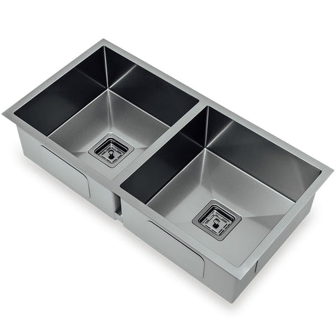 Squareline Double Bowl Sink - Linen Features: 880 x 450 x 200 mm (L x W x D)2 x 32L capacityStainless steel, linen finish5 mm Internal radiusDouble bowlPush/pull plug and waste connections.Watermarked designer waste Bowl Size: 400 x 400 x 200mm each (L x