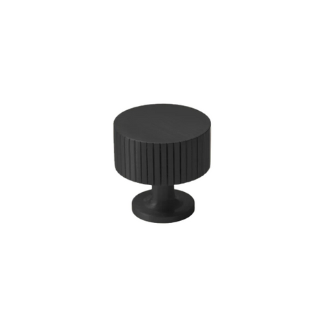 Freya Knob in matte black finish — solid brass cabinet knob with textured detailing for modern and sophisticated interiors.
