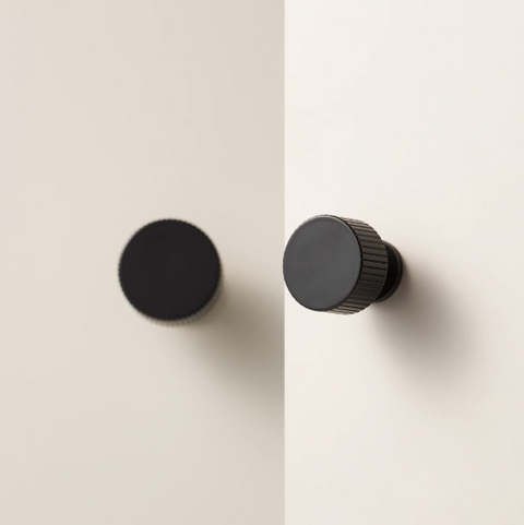 Freya Knob in matte black finish — solid brass cabinet knob with textured detailing for modern and sophisticated interiors.