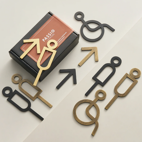 Elegant gold solid brass bathroom and accessibility door sign with universal male and female restroom symbols, high-quality polished finish, ADA-compliant and easy to mount.
