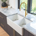 Farmhouse Double Bowl Sink 835mm White Gloss Features: Double fluted reversible farmhouse sink, crafted from fireclay and adorned with an exquisite glossy white finish. This sink offers the flexibility of showcasing either the striking fluted side or a sl