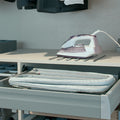 Ironfix Lateral Mounted Ironing Board in Drawer Material: Steel fittingsCotton ironing board cover with foam backing Finish: Fittings: Powder-coated whiteCover: White and grey striped Version: Folding for lateral mounting in drawers Notes: A drawer such a