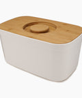 Bread Bin with Bamboo Lid Keep all your bread, rolls and pastries fresher for longer in this stylish bread bin, with a specially designed bamboo lid that doubles as a cutting board for chopping up your bread. Easy-clean storage bin with non-slip base Reve