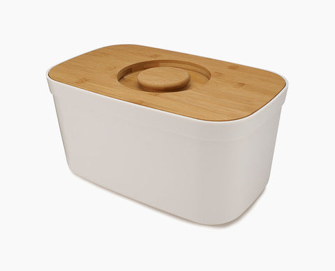 Bread Bin with Bamboo Lid Keep all your bread, rolls and pastries fresher for longer in this stylish bread bin, with a specially designed bamboo lid that doubles as a cutting board for chopping up your bread. Easy-clean storage bin with non-slip base Reve