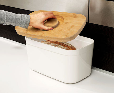 Bread Bin with Bamboo Lid Keep all your bread, rolls and pastries fresher for longer in this stylish bread bin, with a specially designed bamboo lid that doubles as a cutting board for chopping up your bread. Easy-clean storage bin with non-slip base Reve