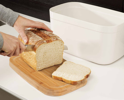 Bread Bin with Bamboo Lid Keep all your bread, rolls and pastries fresher for longer in this stylish bread bin, with a specially designed bamboo lid that doubles as a cutting board for chopping up your bread. Easy-clean storage bin with non-slip base Reve