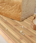 Bread Bin with Bamboo Lid Keep all your bread, rolls and pastries fresher for longer in this stylish bread bin, with a specially designed bamboo lid that doubles as a cutting board for chopping up your bread. Easy-clean storage bin with non-slip base Reve
