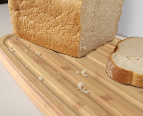 Bread Bin with Bamboo Lid Keep all your bread, rolls and pastries fresher for longer in this stylish bread bin, with a specially designed bamboo lid that doubles as a cutting board for chopping up your bread. Easy-clean storage bin with non-slip base Reve