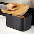 Bread Bin with Bamboo Lid Keep all your bread, rolls and pastries fresher for longer in this stylish bread bin, with a specially designed bamboo lid that doubles as a cutting board for chopping up your bread. Easy-clean storage bin with non-slip base Reve