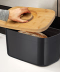 Bread Bin with Bamboo Lid Keep all your bread, rolls and pastries fresher for longer in this stylish bread bin, with a specially designed bamboo lid that doubles as a cutting board for chopping up your bread. Easy-clean storage bin with non-slip base Reve