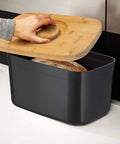 Bread Bin with Bamboo Lid Keep all your bread, rolls and pastries fresher for longer in this stylish bread bin, with a specially designed bamboo lid that doubles as a cutting board for chopping up your bread. Easy-clean storage bin with non-slip base Reve