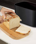 Bread Bin with Bamboo Lid Keep all your bread, rolls and pastries fresher for longer in this stylish bread bin, with a specially designed bamboo lid that doubles as a cutting board for chopping up your bread. Easy-clean storage bin with non-slip base Reve