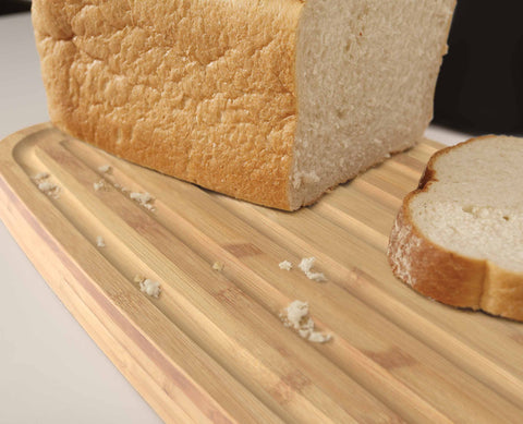 Bread Bin with Bamboo Lid Keep all your bread, rolls and pastries fresher for longer in this stylish bread bin, with a specially designed bamboo lid that doubles as a cutting board for chopping up your bread. Easy-clean storage bin with non-slip base Reve