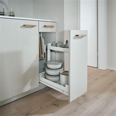 Peka Pinello Board white baking tray and chopping board pull-out with oak handles and storage bowls in a bright white kitchen