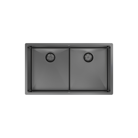 A top-down view of a dark gray double-bowl undermount kitchen sink with a matte finish and integrated drain assemblies.