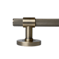 Brass knurled lever handles by KitchenLibrary, showcasing a knurled texture and modern design.