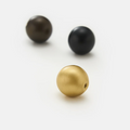 Cassia Knob in polished solid brass — timeless spherical cabinet knob combining classic elegance and lasting craftsmanship.