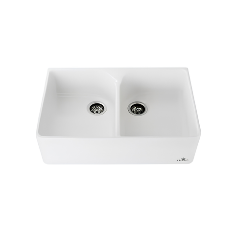 A white double-basin farmhouse-style kitchen sink with a rectangular apron front and two separate basins, shown on a plain white background.