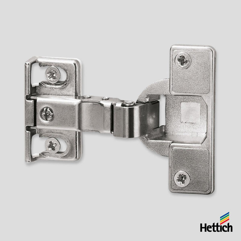 Hettich Special Hinge ET 582 – Short Arm 44mm, Screw-On Special hinge with short hinge protrusion for refrigerator surrounds Cup diameter 35 mm Cup depth 12.8 mm With stay closed function Including mounting plate and distance plate (distance = 3 mm) for o