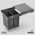 Hettich Atira Bin Set – Includes Drawer – Anthracite Upgrade your kitchen with the Hettich Atira Bin Set in Anthracite, an integrated waste solution that combines style with functionality. This premium pull-out system features the durable Atira drawer in