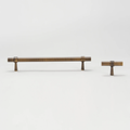 Kia solid brass handle in bronze finish, sleek and durable door or drawer handle