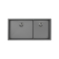A top-down view of a dark gray double basin kitchen sink with a matte finish and integrated drain strainers, isolated on a white background.