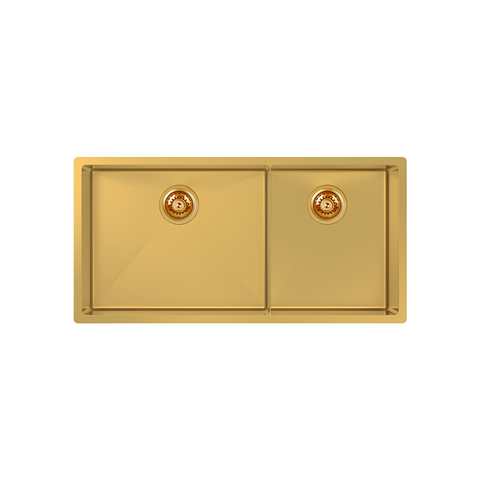 A rectangular double-sink kitchen faucet or sink unit in a polished gold finish, shown from a top-down perspective on a solid white background.