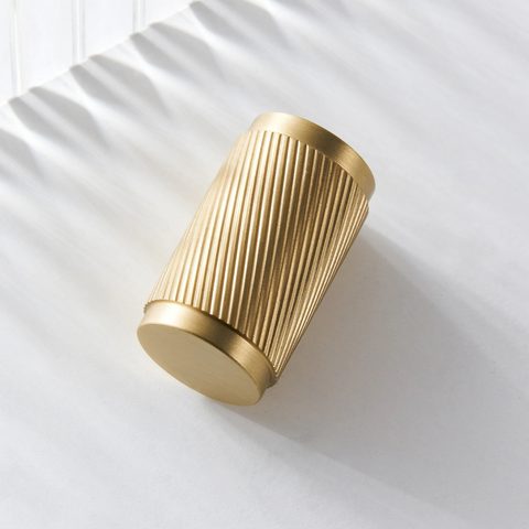 Twirlix solid brass furniture knob in gold finish, modern cabinet and drawer handle