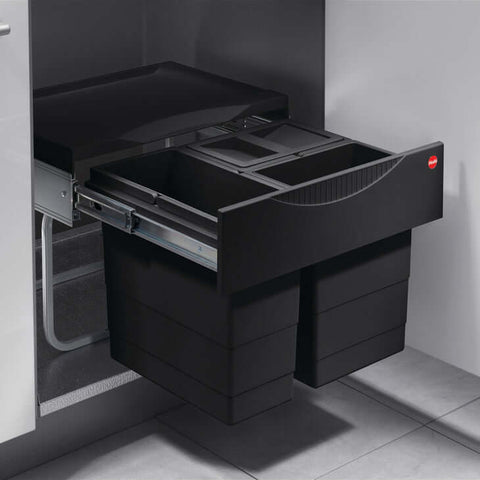 Hailo Tandem-S pull-out waste bin system 28L with black inner pails in a kitchen cabinet
