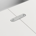 Zinc-finish joiner plate recessed across the join between two adjoining cabinet panel surfaces