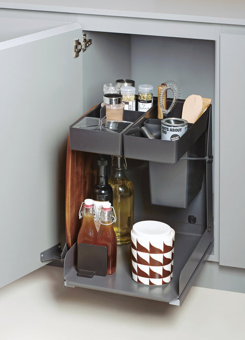Peka Kitchen Tower anthracite lift-out caddy extended from a base cabinet with bottles, jars and utensils