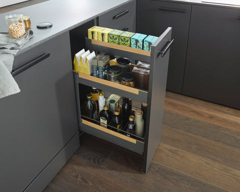 Peka Pinello Spice anthracite base unit pull-out with tiered shelves of spice boxes, jars and bottles in a modern kitchen
