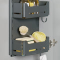 Peka Sesam Mini anthracite wall-mounted adjustable shelves holding cleaning bottles, a dish brush and sponges