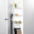 Peka Sesam Standard white cleaning cupboard shelving system with adjustable shelves of cleaning supplies above a bucket