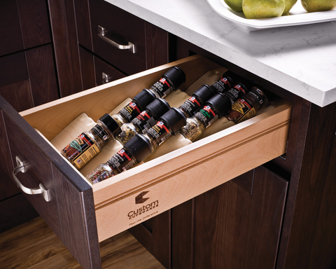 Häfele Salsa Pro spice tray fitted in an open timber kitchen drawer, holding spice jars tilted so the labels face up